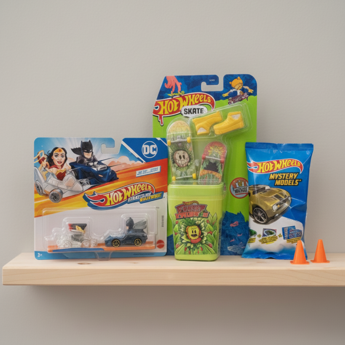 Hot Wheels toy packages on a shelf with a plain background - KWtoyszone | Proudly Canadian
