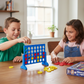 Two children playing a game of Connect Four at a table - KWtoyszone | Proudly Canadian