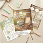 Printable Chill Capy Goals Journal worksheets arranged flat lay with pastel stationery.